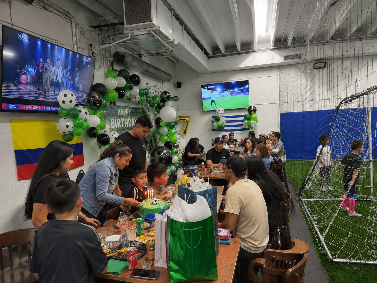 Players on the indoor field at Granada Indoor Soccer